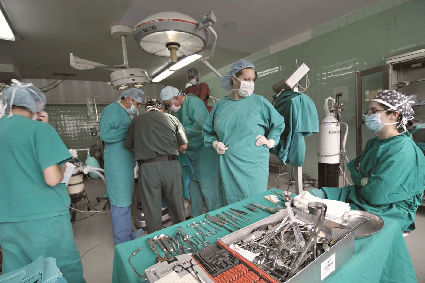 A surgical team working in a hospital operating room